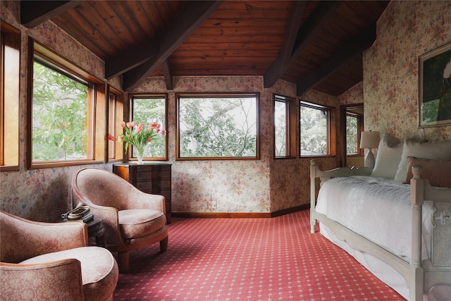 bedroom featuring lofted ceiling with beams, wood ceiling, and carpet flooring