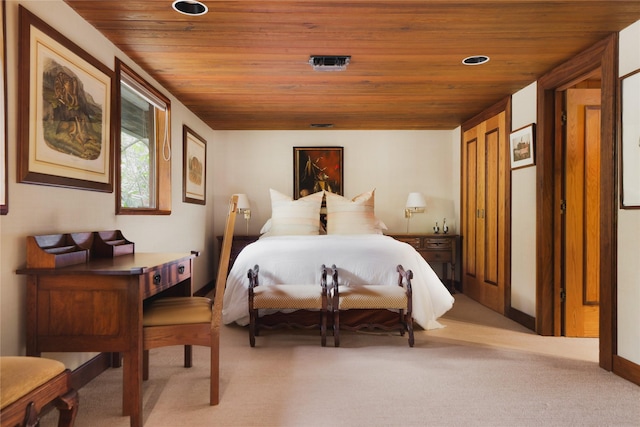 carpeted bedroom featuring wooden ceiling