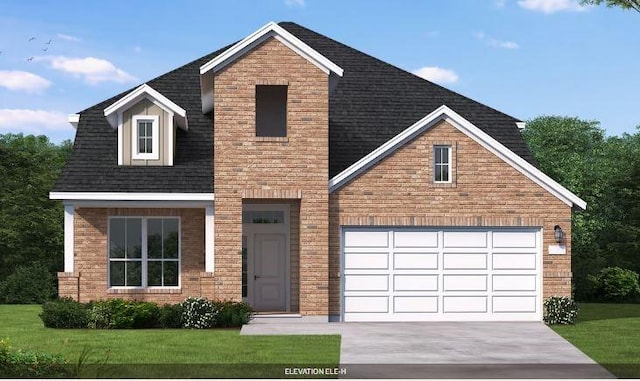 view of front of home with a front yard and a garage