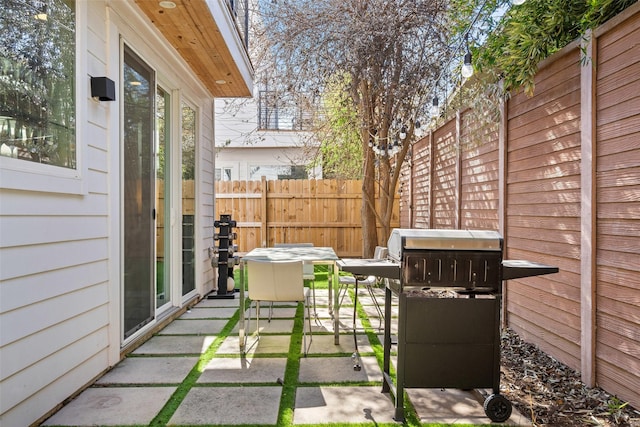 view of patio / terrace with a grill