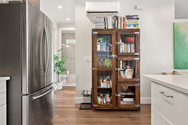 interior space featuring an AC wall unit