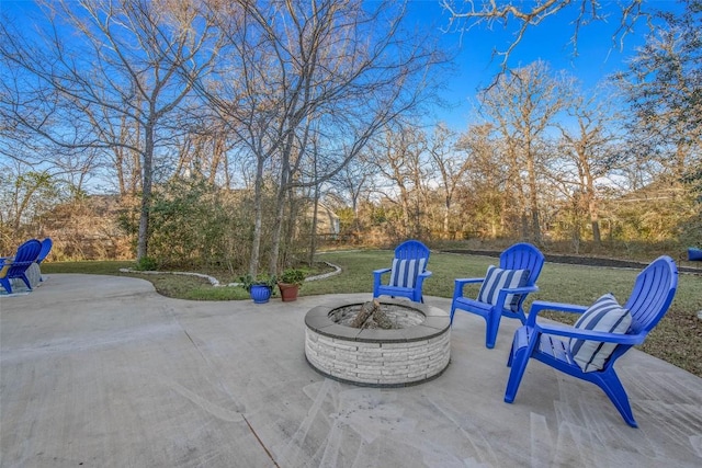 view of patio / terrace featuring a fire pit