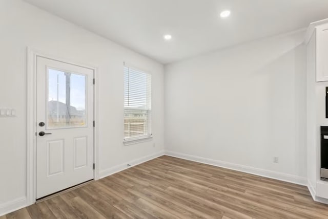 entrance foyer featuring light wood-type flooring