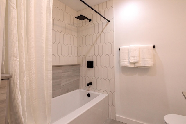 bathroom with toilet and shower / bath combination with curtain