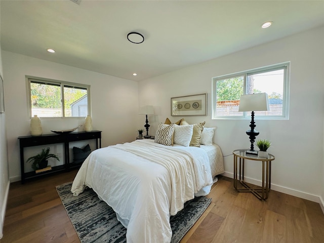 bedroom featuring hardwood / wood-style floors