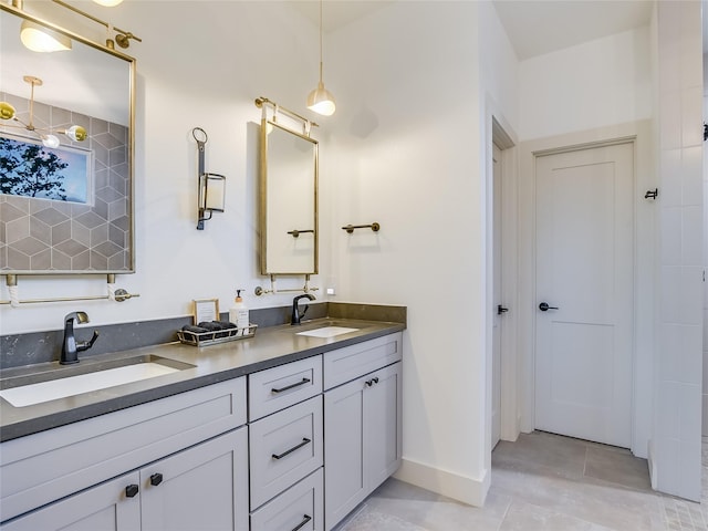 bathroom featuring vanity and tile patterned flooring