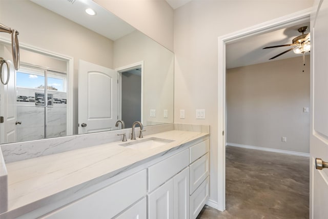 bathroom with ceiling fan, vanity, and concrete floors