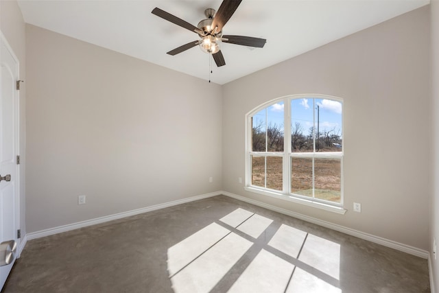 empty room featuring ceiling fan and carpet flooring