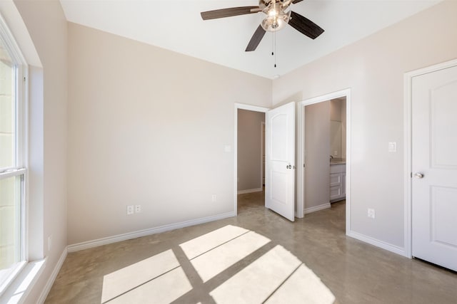 unfurnished bedroom featuring ceiling fan