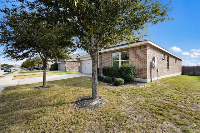 single story home with a garage and a front yard