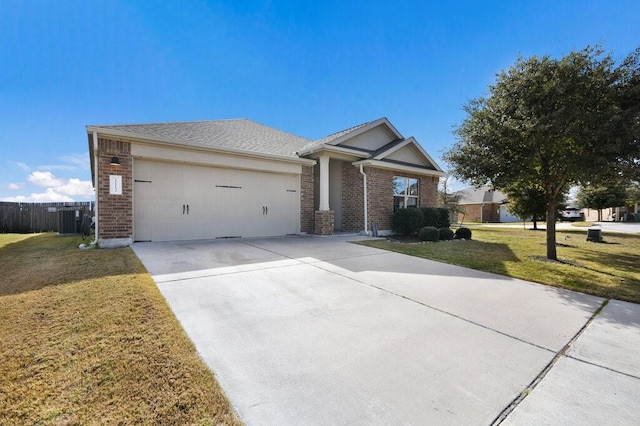 ranch-style home with a garage, a front yard, and central AC