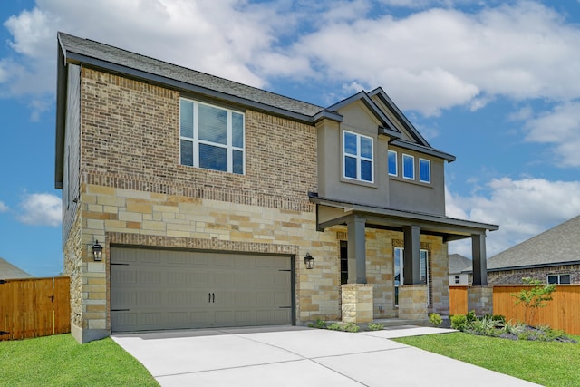 view of front facade featuring a porch and a garage