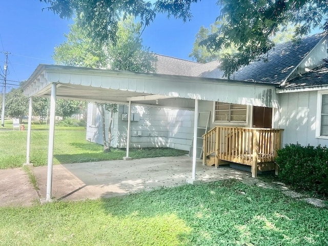 view of patio / terrace featuring a carport