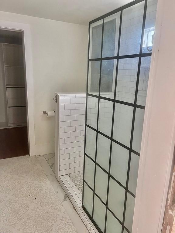 bathroom with walk in shower