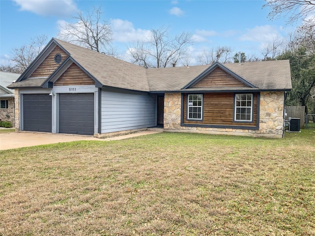 ranch-style house with a garage, central AC unit, and a front lawn