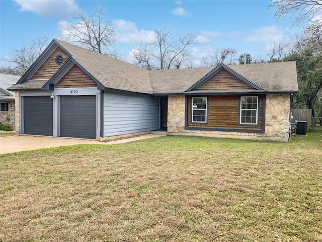 5103 Ganymede Dr, Austin, TX 78727 - ranch-style home featuring stone siding, a garage, cooling unit, a front lawn, and a shingled roof