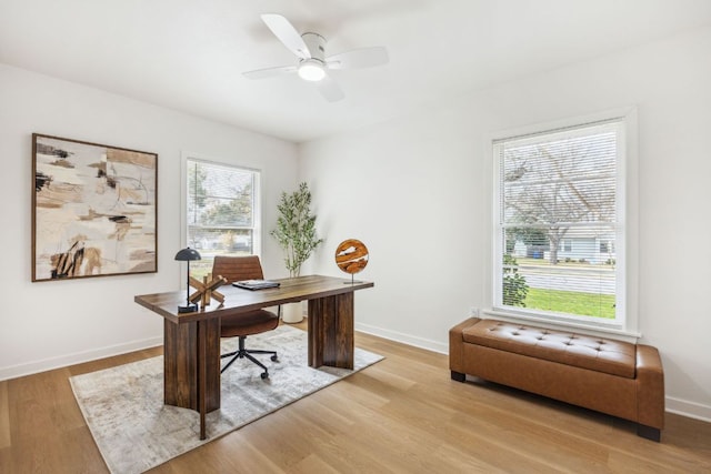 5807 Shoalwood Ave, Austin, TX 78756 - home office featuring wood finished floors and a ceiling fan