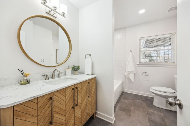 bathroom with toilet, baseboards, visible vents, and vanity