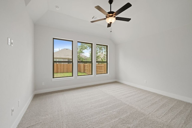 314 Five Mile Creek Way, Kyle, TX 78640 - carpeted empty room featuring vaulted ceiling, baseboards, a ceiling fan, and a smoke detector