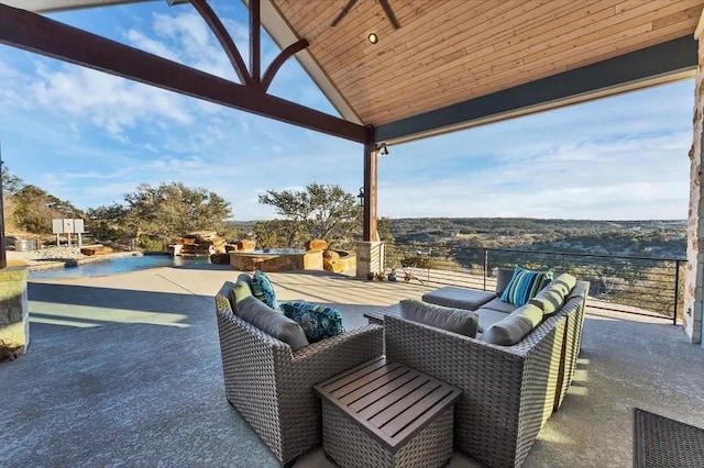 view of patio / terrace featuring ceiling fan and outdoor lounge area