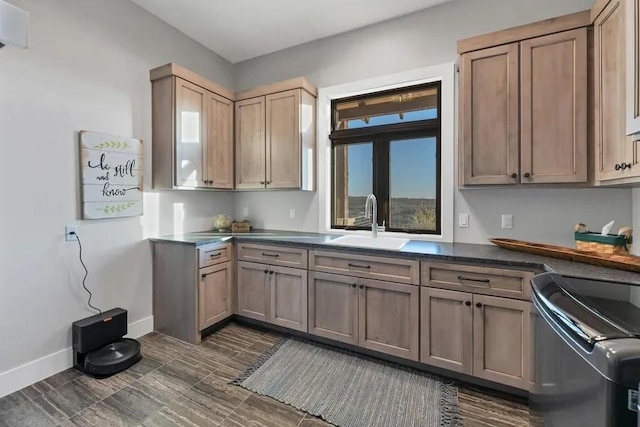 kitchen featuring electric range oven and sink