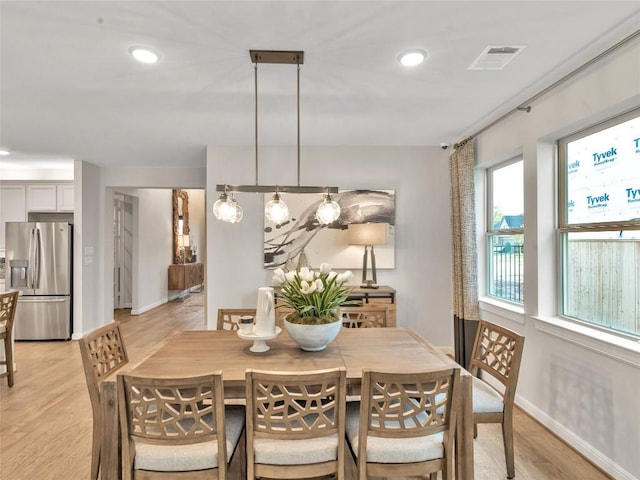 dining area with visible vents, recessed lighting, baseboards, and light wood-type flooring