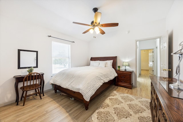 bedroom featuring light hardwood / wood-style floors and ceiling fan