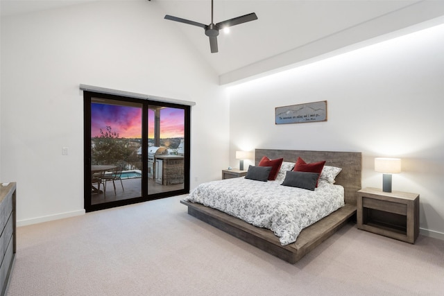 carpeted bedroom with ceiling fan, access to exterior, and high vaulted ceiling