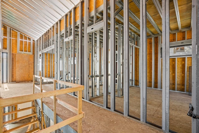 miscellaneous room featuring lofted ceiling