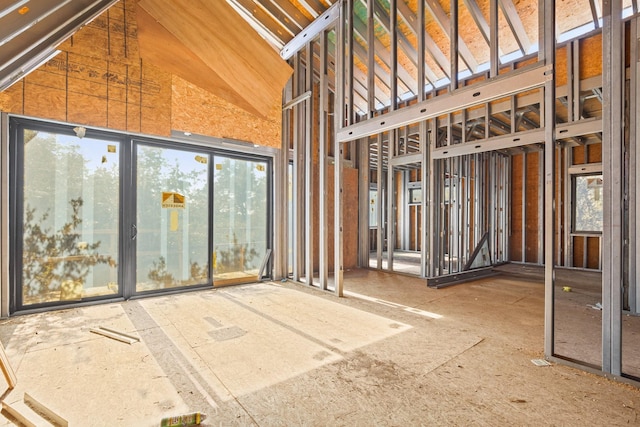 miscellaneous room with high vaulted ceiling