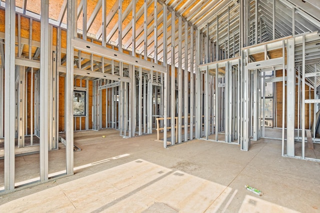 misc room with high vaulted ceiling