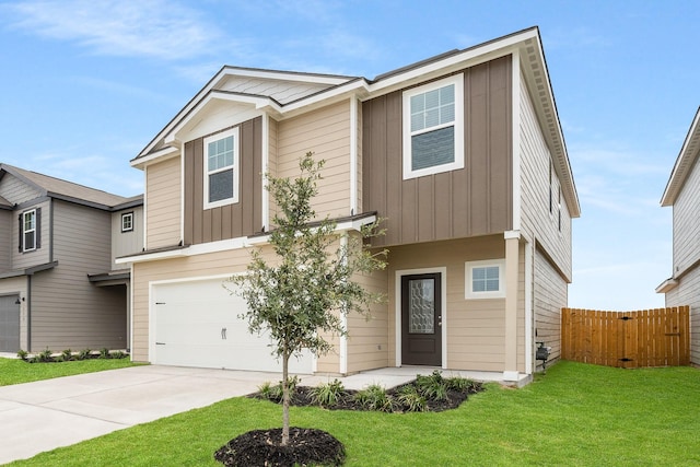 view of front of house with a front lawn and a garage