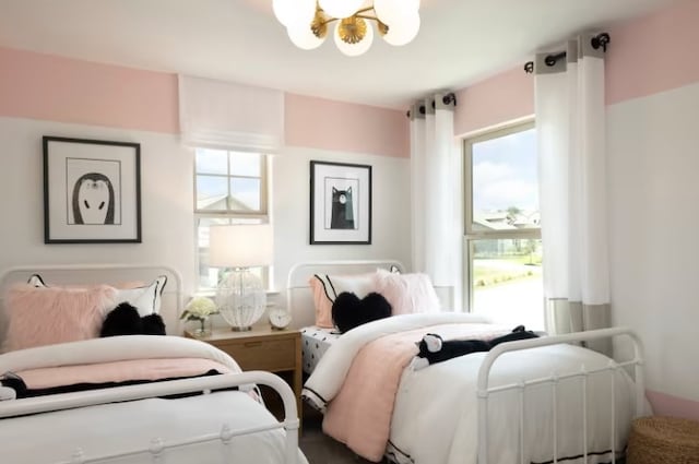 bedroom with a chandelier