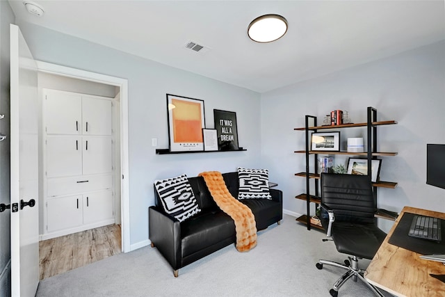 view of carpeted home office