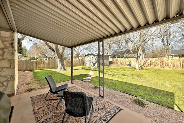 view of patio / terrace with a storage shed