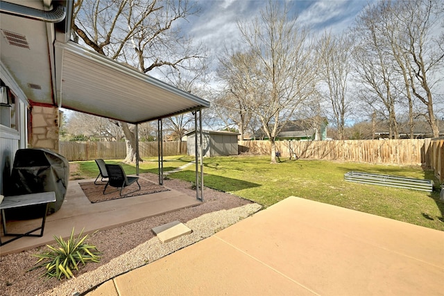 view of patio featuring a storage unit and a grill