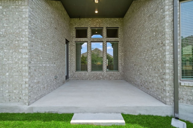 305 Five Mile Creek Way, Kyle, TX 78640 - property entrance with a patio