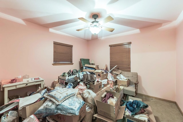 miscellaneous room with ceiling fan and carpet floors