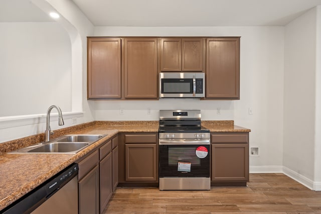 kitchen with sink and stainless steel appliances