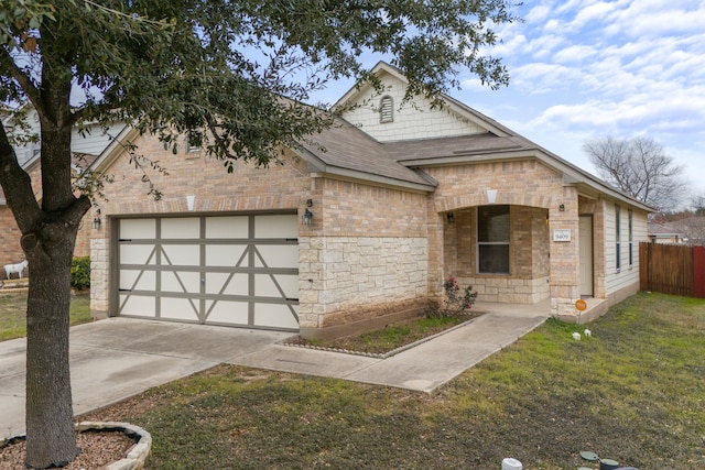 view of front of home with a garage and a front lawn