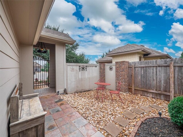 238 Rock Bluff Ln, San Marcos, TX 78666 - view of patio / terrace with fence and a gate