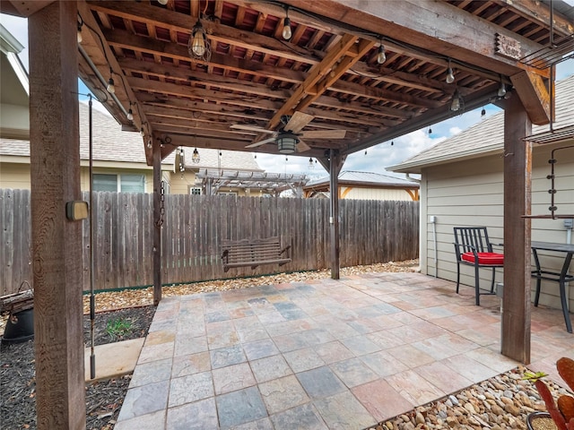 view of patio / terrace featuring ceiling fan