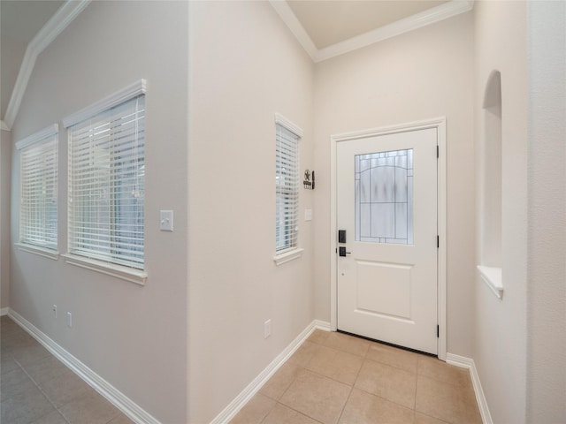 doorway to outside featuring ornamental molding and light tile patterned flooring