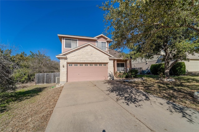 front of property featuring a garage