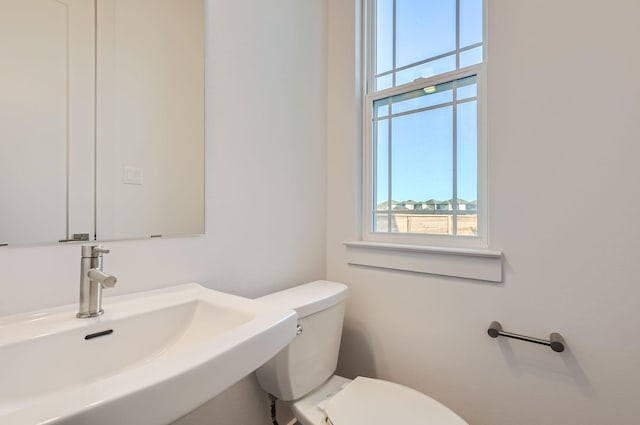 bathroom with sink and toilet