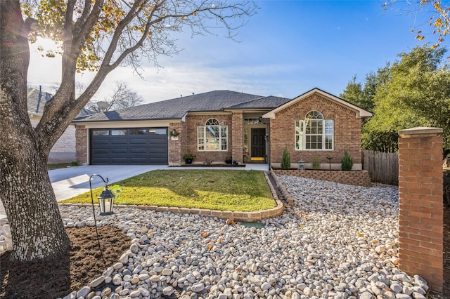 single story home featuring a front lawn and a garage