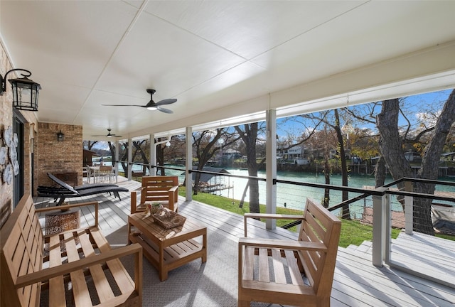 150 Turtle Ln, Seguin, TX 78155 - sunroom / solarium with a water view, ceiling fan, and an outdoor hangout area