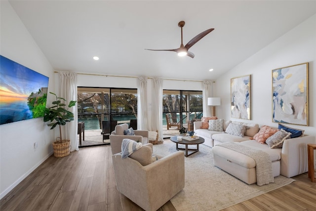150 Turtle Ln, Seguin, TX 78155 - living room featuring vaulted ceiling, wood finished floors, ceiling fan, recessed lighting, and baseboards