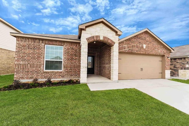 view of front of house with a front lawn and a garage