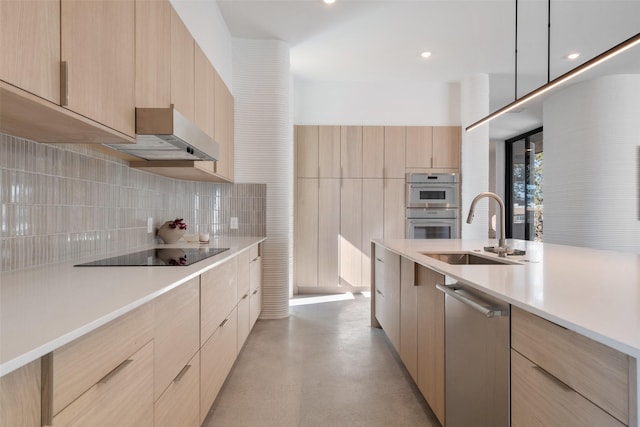 kitchen featuring stainless steel appliances, backsplash, decorative light fixtures, light brown cabinetry, and sink